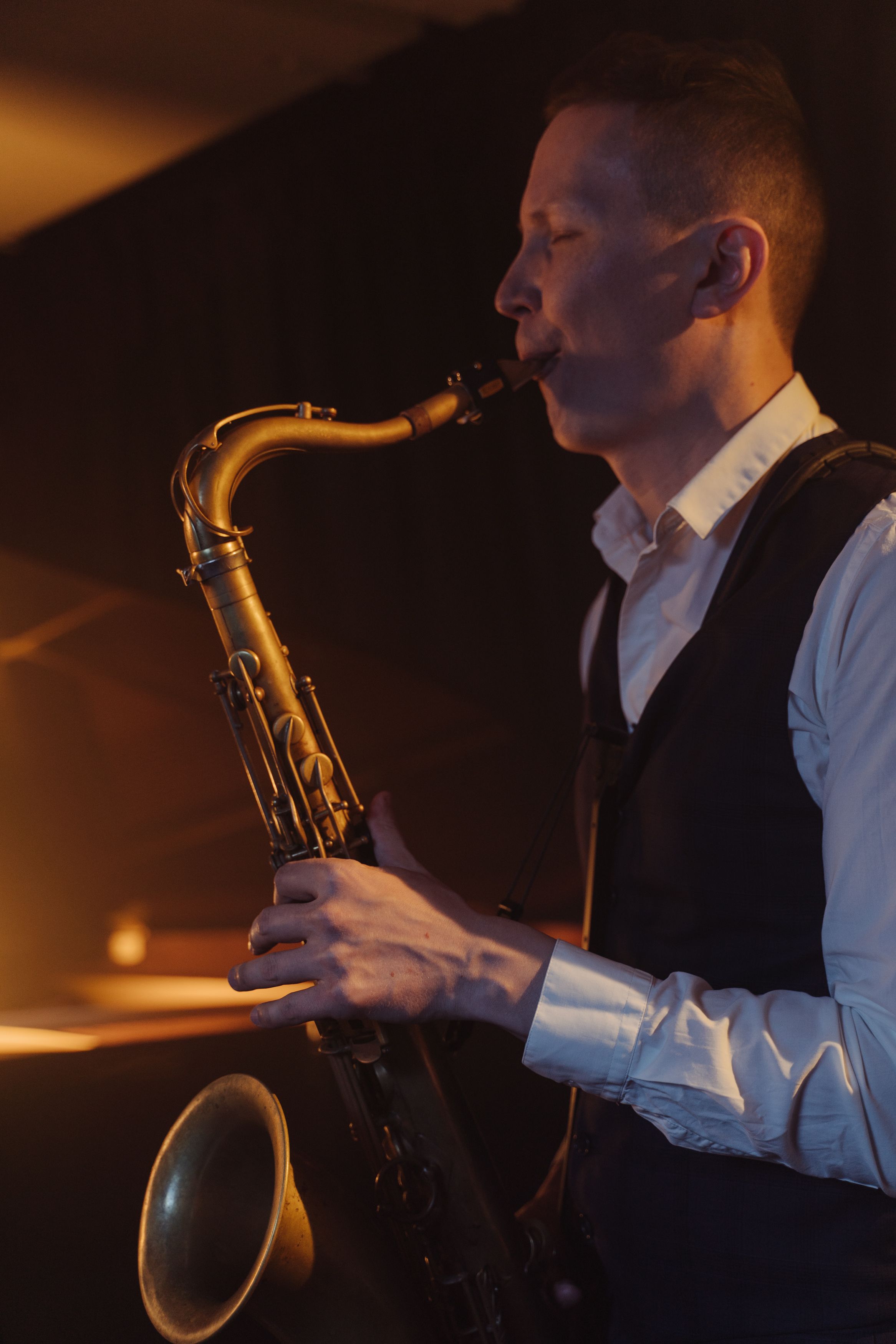 Saxophonist performing on stage