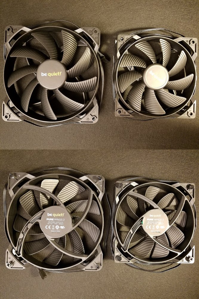 be quiet!のPure Wings 2、140mmと120mmのケースファンを表と裏から並べた写真