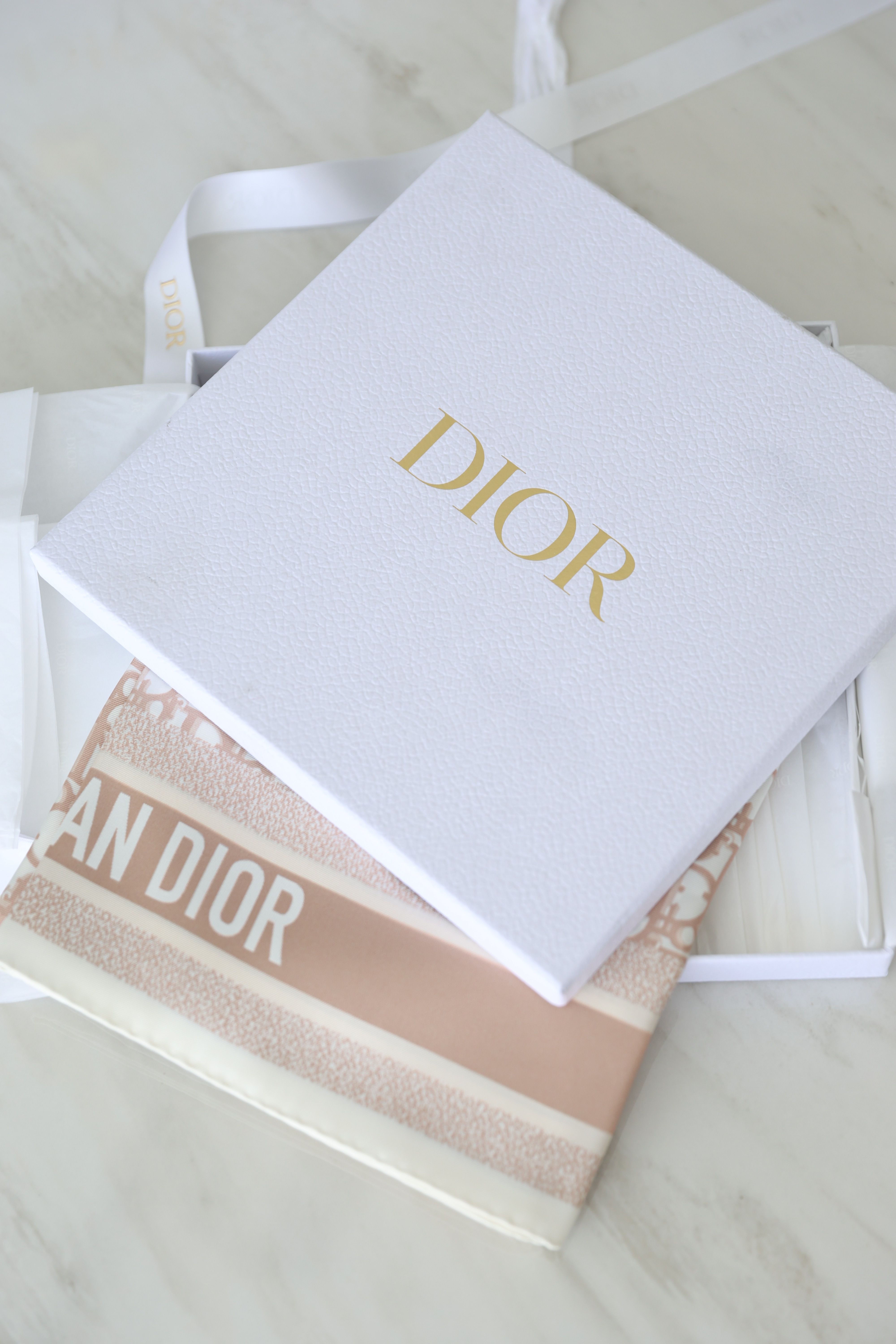 Luxury Dior scarf folded in presentation box
